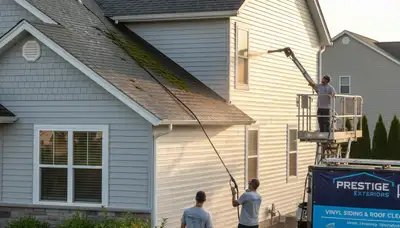 Professional roof cleaning service in Vancouver WA removing moss and debris from residential shingles